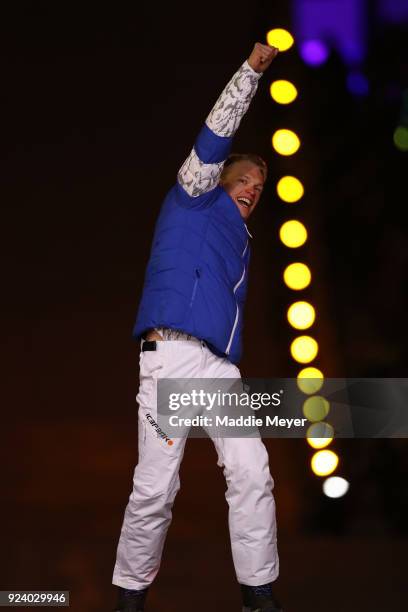 Gold medalist Iivo Niskanen of Finland poses during the medal ceremony for the Cross-Country Skiing - Men's 50km Mass Start Classic during the...