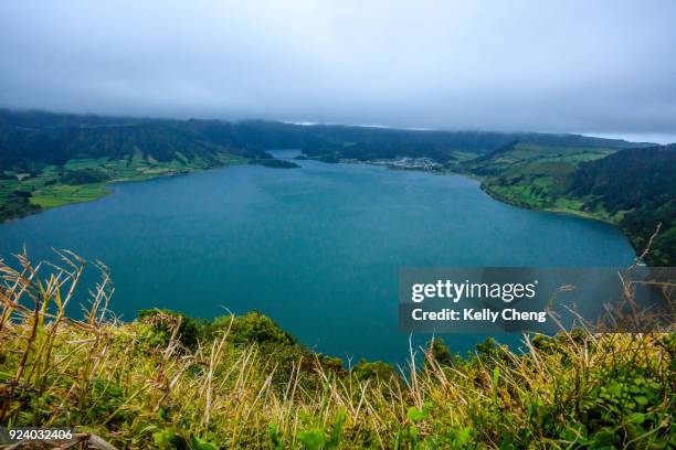 view of sete cidades and lagoa azul - cidades foto e immagini stock