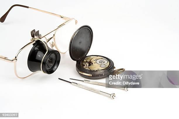 watch mending loupe and tools - jeweller tools stock pictures, royalty-free photos & images