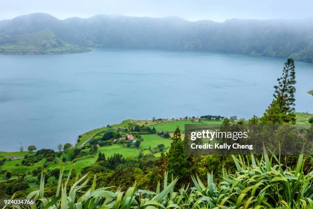 view of sete cidades and lagoa azul - cidades foto e immagini stock