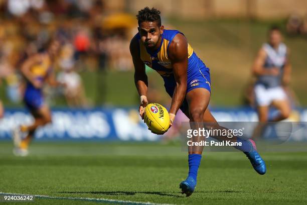 Lewis Jetta of the Eagles looks to handball during the JLT Community Series AFL match between the West Coast Eagles and the Port Adelaide Power at...