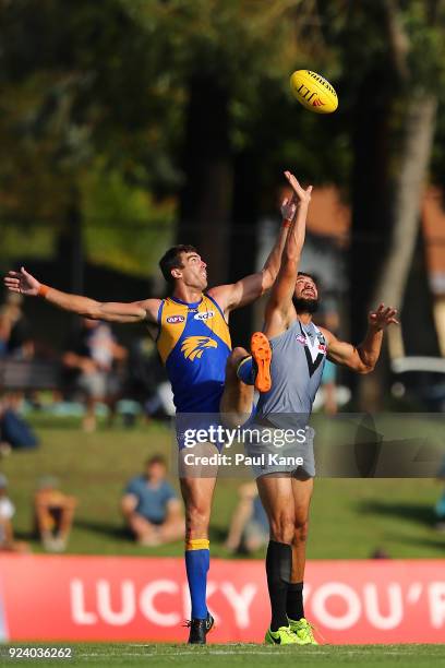 Scott Lycett of the Eagles and Patrick Ryder of the Power contest the ruck during the JLT Community Series AFL match between the West Coast Eagles...