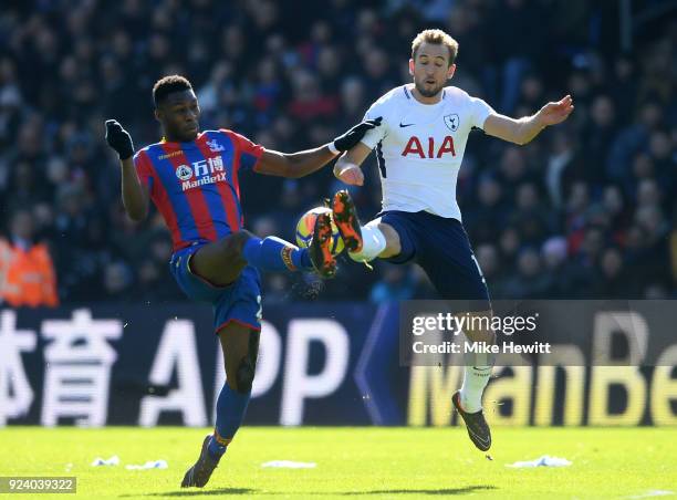 Timothy Fosu-Mensah of Crystal Palace and Harry Kane of Tottenham Hotspur compete for the ball during the Premier League match between Crystal Palace...