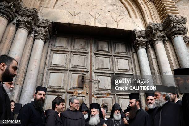 Greek Orthodox Patriarch of Jerusalem Theophilos III delivers a statement to the press as he stands next to the Custodian of the Holy Land Fr....