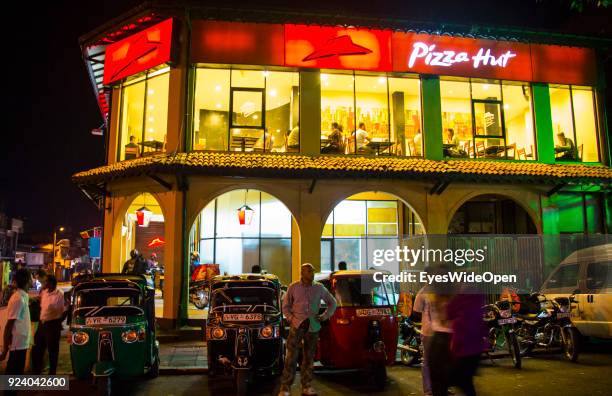 Pizza Hut restaurant where local people and tourists visit the Sri Dalada Maligawa , the Temple of the Sacred Tooth Relic, a Buddhist temple on...