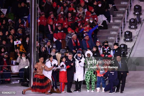 President of the International Olympic Committee Thomas Bach and Lee Hee-beom, President & CEO of PyeongChang Organizing Committee stand on the stage...