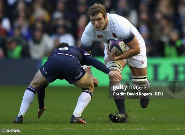 Joe Launchbury of England is tackled by Greig Laidlaw during the NatWest Six Nations match between Scotland and England at Murrayfield on February...