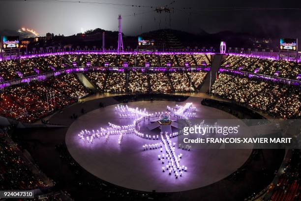 General view as the Olympic flame is set off at the end of the closing ceremony of the Pyeongchang 2018 Winter Olympic Games at the Pyeongchang...