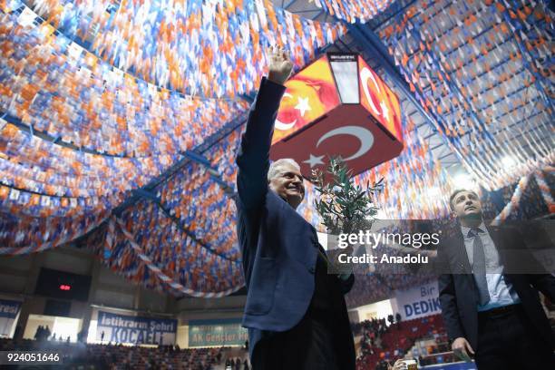 Prime Minister of Turkey and Vice Chairman of Turkey's ruling Justice and Development Party Binali Yildirim greets the crowd during the 6th ordinary...