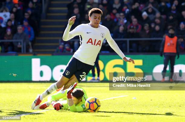 Dele Alli of Tottenham Hotspur is challenged by Wayne Hennessey of Crystal Palace during the Premier League match between Crystal Palace and...