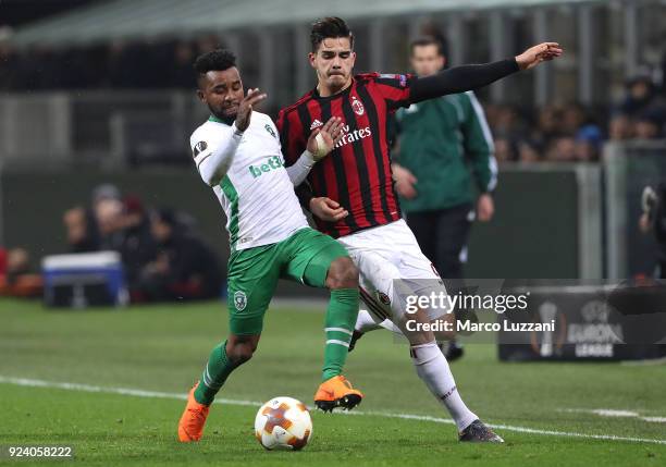 Cicinho of Ludogorets Razgrad competes for the ball with Andre Silva of AC Milan during UEFA Europa League Round of 32 match between AC Milan and...