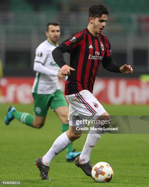 Andre Silva of AC Milan drives the ball during UEFA Europa League Round of 32 match between AC Milan and Ludogorets Razgrad at the San Siro on...