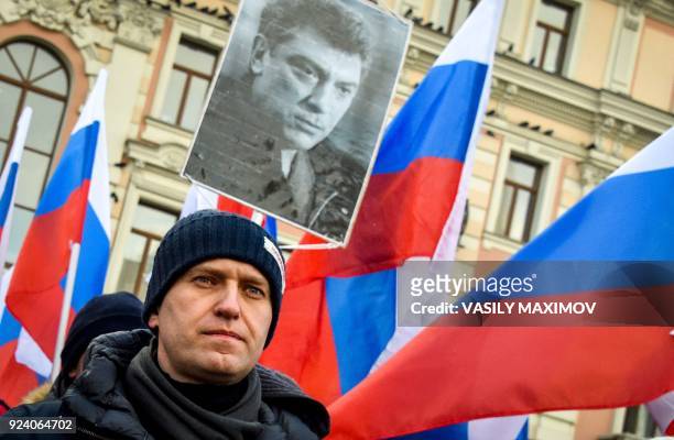Russian opposition leader Alexey Navalny attends an opposition march in memory of murdered Kremlin critic Boris Nemtsov in central Moscow on February...