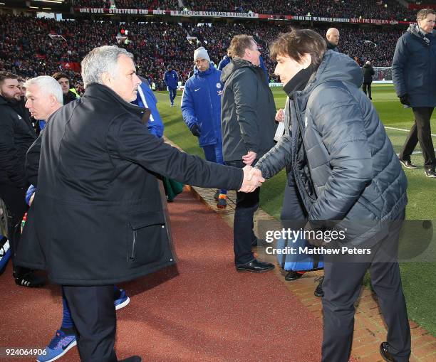 Manager Jose Mourinho of Manchester United shakes hands with Manager Antonio Conte of Chelsea ahead of the Premier League match between Manchester...