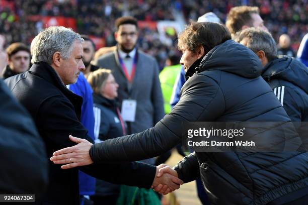 Jose Mourinho, Manager of Manchester United and Antonio Conte, Manager of Chelsea shake hands during the Premier League match between Manchester...