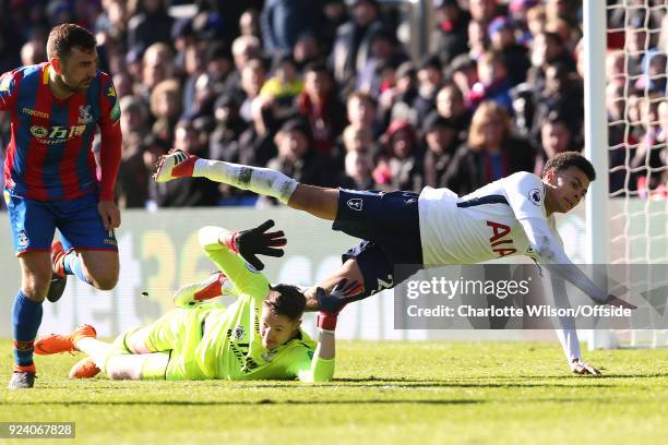 Dele Alli of Tottenham goes over the top of Crystal Palace goalkeeper Wayne Hennessey during the Premier League match between Crystal Palace and...