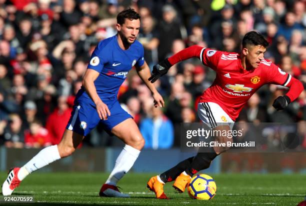 Alexis Sanchez of Manchester United breaks away from Danny Drinkwater of Chelsea in action during the Premier League match between Manchester United...