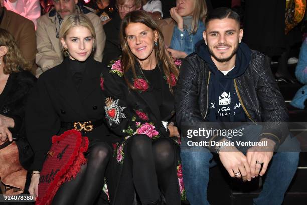 Caro Daur, Anna Dello Russo and Mauro Icardi attend the Dolce & Gabbana show during Milan Fashion Week Fall/Winter 2018/19 on February 25, 2018 in...
