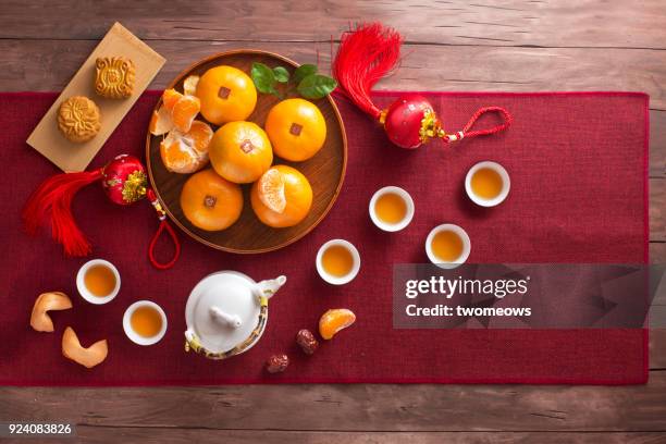 flat lay chinese new year food and drink still life. - lunar new year cup 2017 stock-fotos und bilder