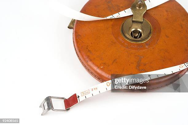 surveyors leather cased 100 metretape measure - meter length stock pictures, royalty-free photos & images