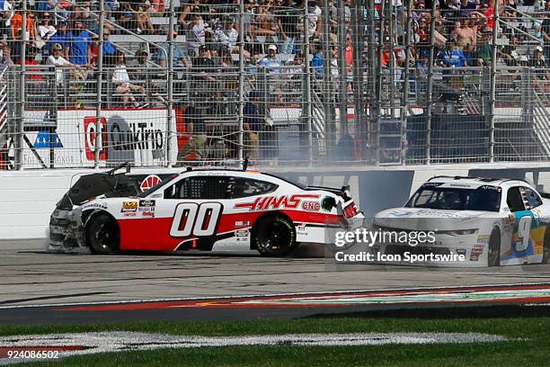 Tyler Reddick, JR Motorsports Chevrolet Camaro misses the wrecking car of Cole Custer, Stewart-Haas Racing with Biagi-Denbeste Racing Ford Mustang...