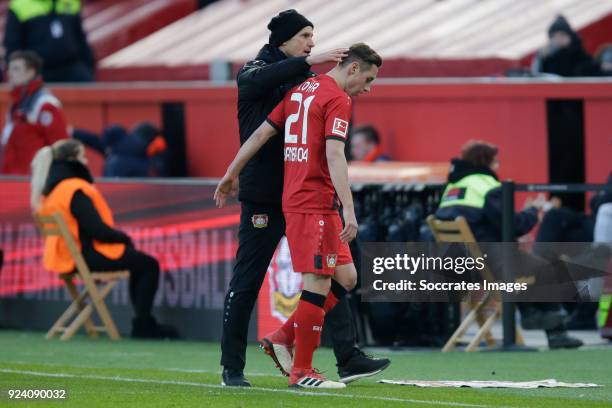 Dominik Kohr of Bayer Leverkusen is leaving the pitch after receiving a red card coach Heiko Herrlich of Bayer Leverkusen during the German...