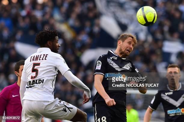 Nice's French midfielder Adrien Tameze vies with Bordeaux's Czech midfielder Jaroslav Plasil during the French L1 football match between Bordeaux and...