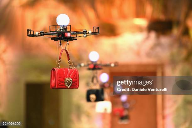 Drones carry handbags down the runway at the Dolce & Gabbana show during Milan Fashion Week Fall/Winter 2018/19 on February 25, 2018 in Milan, Italy.