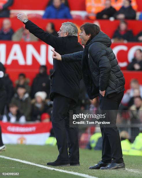 Manager Jose Mourinho of Manchester United and Manager Antonio Conte of Chelsea watch from the touchline during the Premier League match between...