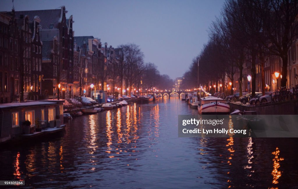 Amsterdam canal in winter at night