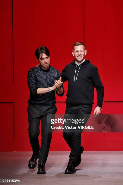 Designers Guillaume Meilland and Paul Andrew walk the runway at the Salvatore Ferragamo Ready to Wear Fall/Winter 2018-2019 fashion show during Milan...