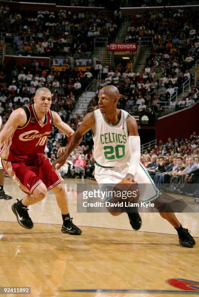 Ray Allen of the Boston Celtics drives to the basket against Anthony Parker of the Cleveland Cavaliers during the season opener on October 27, 2009...