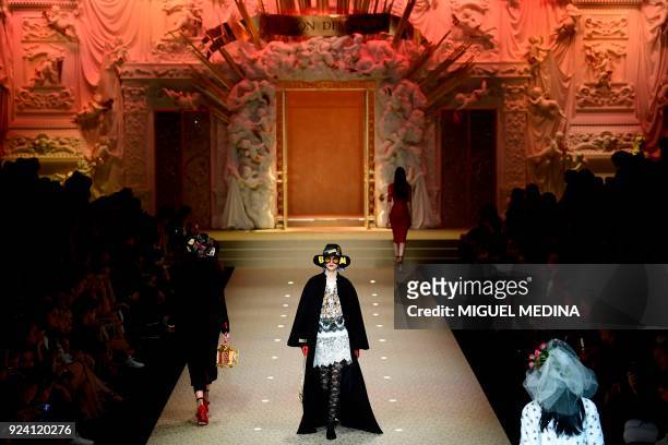 Models present creations by Dolce & Gabbana during the women's Fall/Winter 2018/2019 collection fashion show in Milan, on February 25, 2018. / AFP...