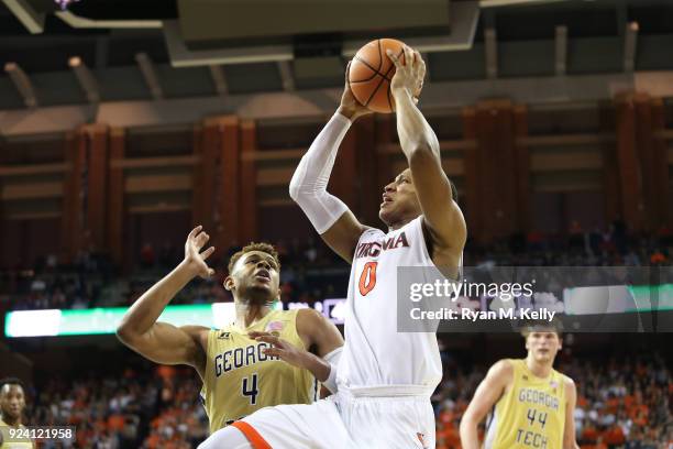 Devon Hall of the Virginia Cavaliers shoots over Brandon Alston of the Georgia Tech Yellow Jackets in the second half during a game at John Paul...