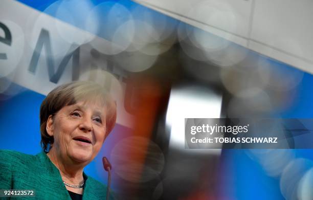 German Chancellor Angela Merkel, also leader of Germany's conservative Christian Democratic Union party, gives a press conference following sessions...