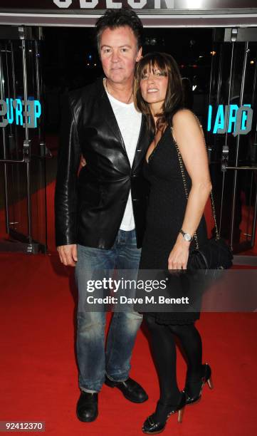 Musician Paul Young and his wife Stacey Young arrive at the UK film premiere of 'This Is It', at the Odeon Leicester Square on October 27, 2009 in...