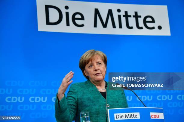 German Chancellor Angela Merkel, also leader of Germany's conservative Christian Democratic Union party, gives a press conference following sessions...