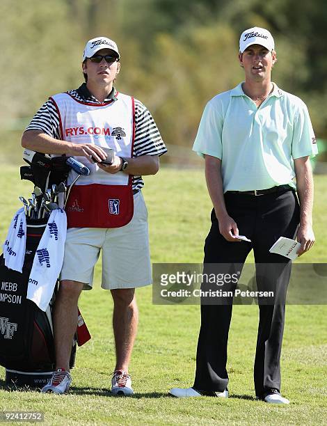 Web Simpson stands with his caddie and bag during the third round of the Frys.com Open at Grayhawk Golf Club on October 24, 2009 in Scottsdale,...