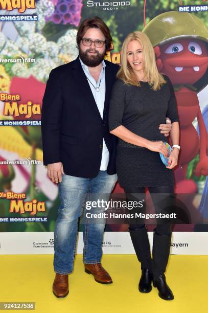 Antoine Monot, Jr. And his partner Stefanie Sick during the premiere of 'Biene Maja - Die Honigspiele' at Mathaeser Filmpalast on February 25, 2018...