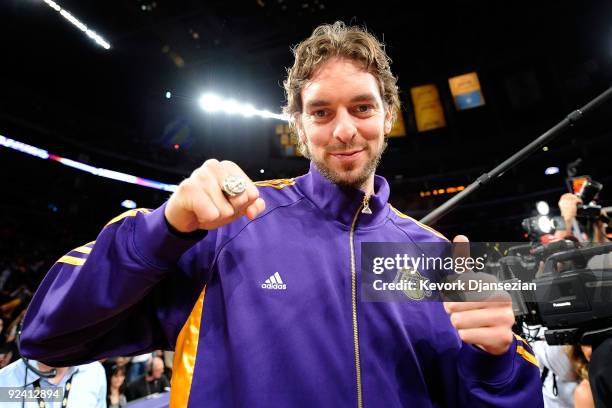 Pau Gasol of the Los Angeles Lakers smiles after receiving his championship ring before the season opening game against the Los Angeles Clippers at...