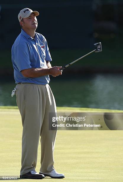 Bill Lunde reacts to a missed putt on the 18th hole green during the fourth round of the Frys.com Open at Grayhawk Golf Club on October 25, 2009 in...