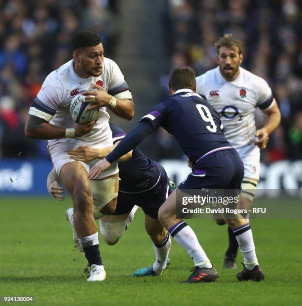 Nathan Hughes of England takes on Greig Laidlaw during the NatWest Six Nations match between Scotland and England at Murrayfield on February 24, 2018...