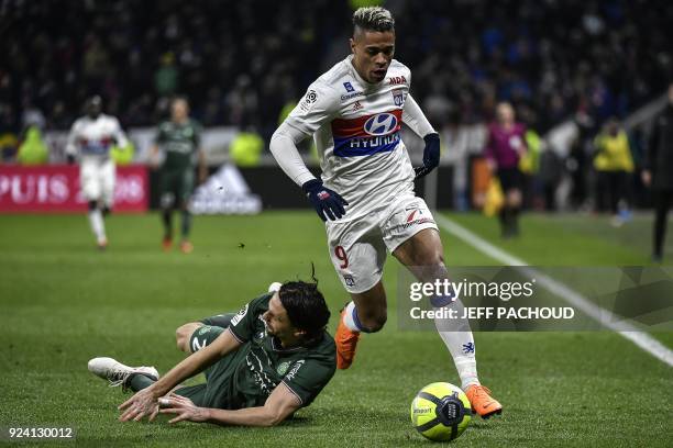 Lyon's Spanish forward Mariano Diaz vies with Saint-Etienne's Serbian defender Neven Subotic during the French L1 football match Olympique Lyonnais...