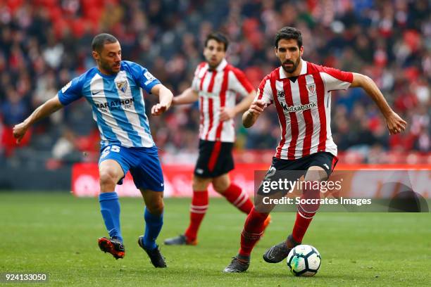 Medhi Lacen of Malaga CF, Raul Garcia of Athletic Bilbao, during the La Liga Santander match between Athletic de Bilbao v Malaga at the Estadio San...