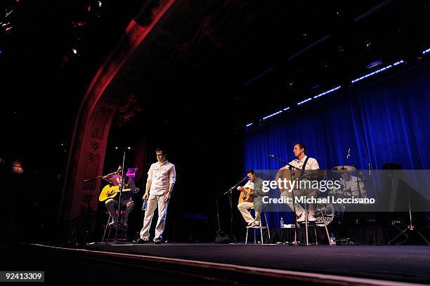 Guitarist Brian Bell, vocalist Rivers Cuomo, guest guitarist Jim McGorman, bassist Scott Shriner and drummer Patrick Wilson of Weezer perform on...