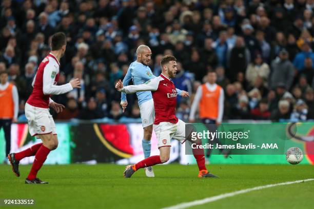 David Silva of Manchester City scores a goal to make it 0-3 during the Carabao Cup Final match between Arsenal and Manchester City at Wembley Stadium...