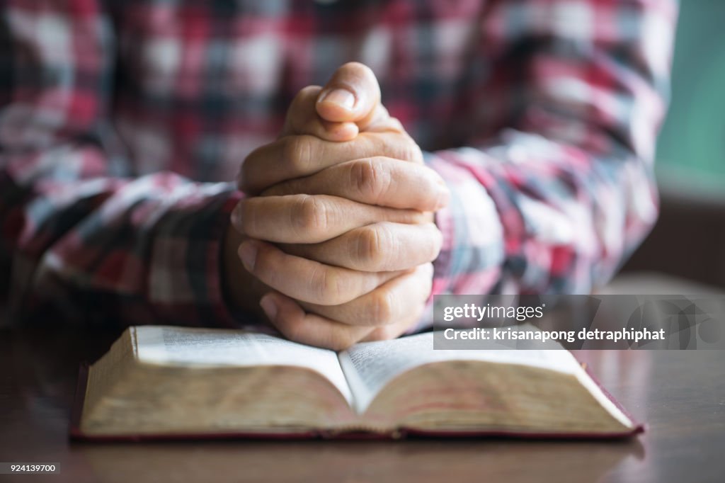 A man reading the Holy Bible.