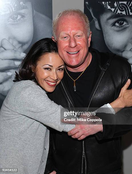 Today Show news anchor Ann Curry and philanthropist Bobby Sager attend "The Power Of The Invisible Sun" book launch party at Donna Karan's Urban Zen...