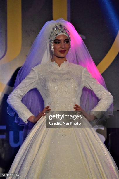 Model walks the runway during a fashion show within the 1st Wedding Preparations Festival in Ankara, Turkey on February 25, 2018.