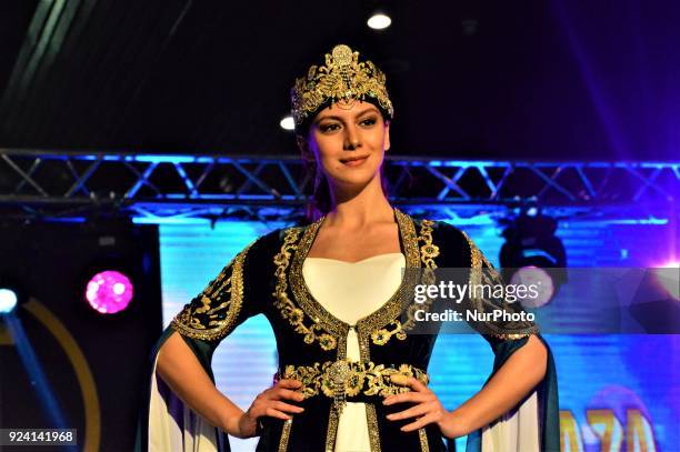 Model walks the runway during a fashion show within the 1st Wedding Preparations Festival in Ankara, Turkey on February 25, 2018.